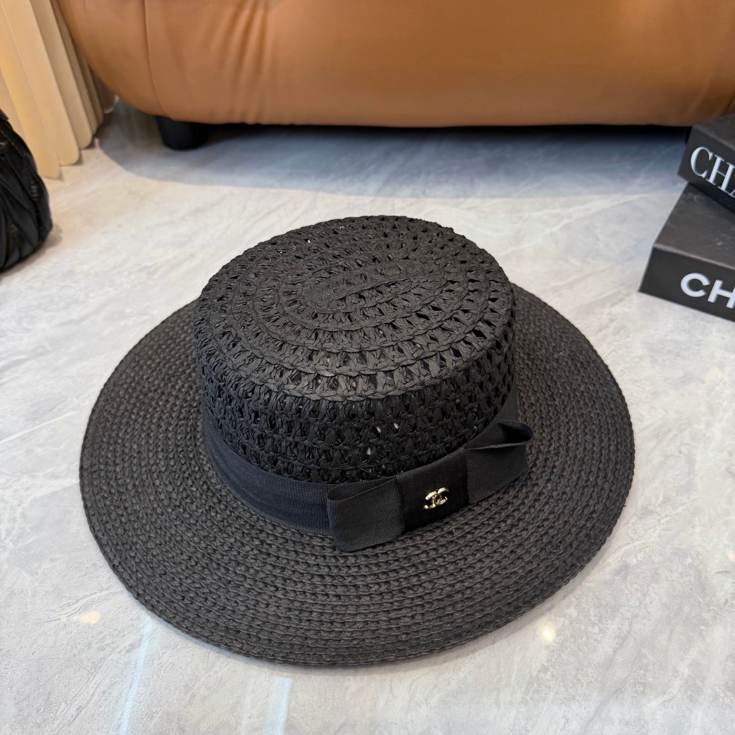 Chanel Straw Hat With Black Ribbon Accent 250043