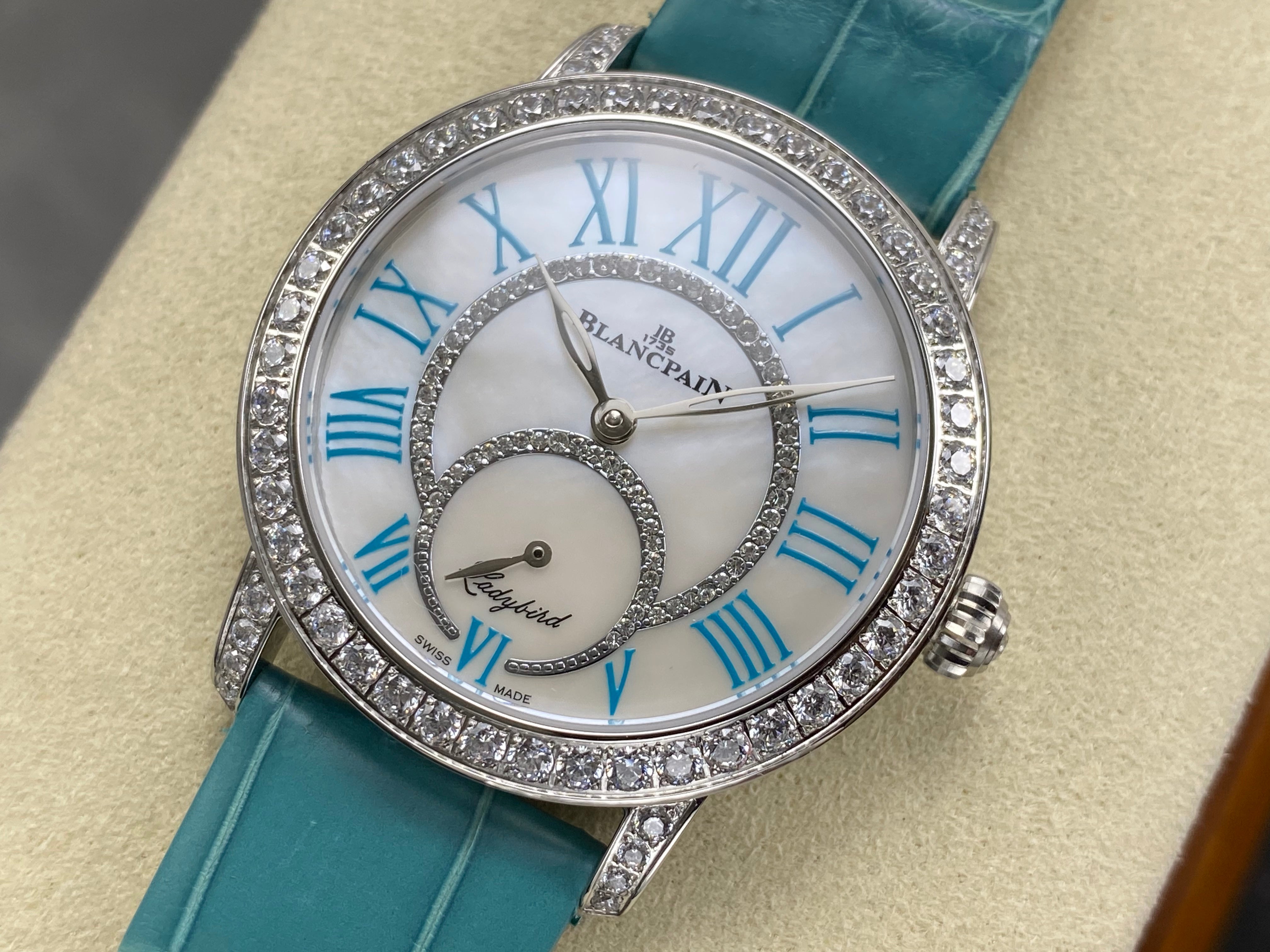 Blancpain's Ladybird 35mm White Blue Dial Diamond Bezel Leather
