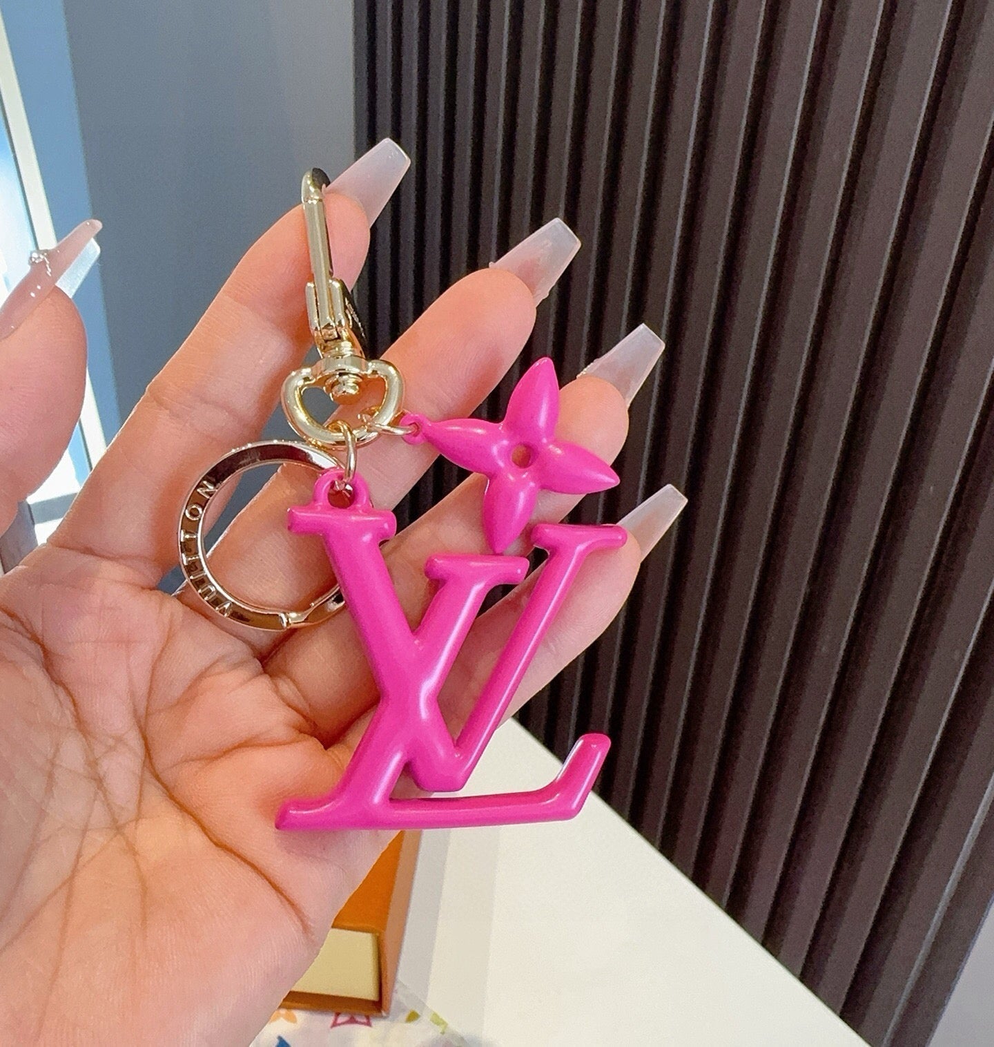 LV Logo Charm 415613
