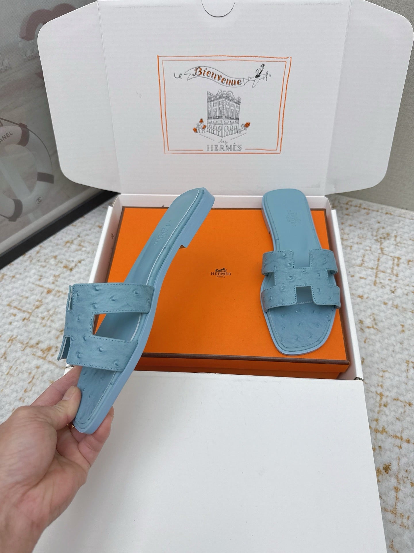 HM 26ss Oran Sandals Light Blue Ostrich Leather 625103
